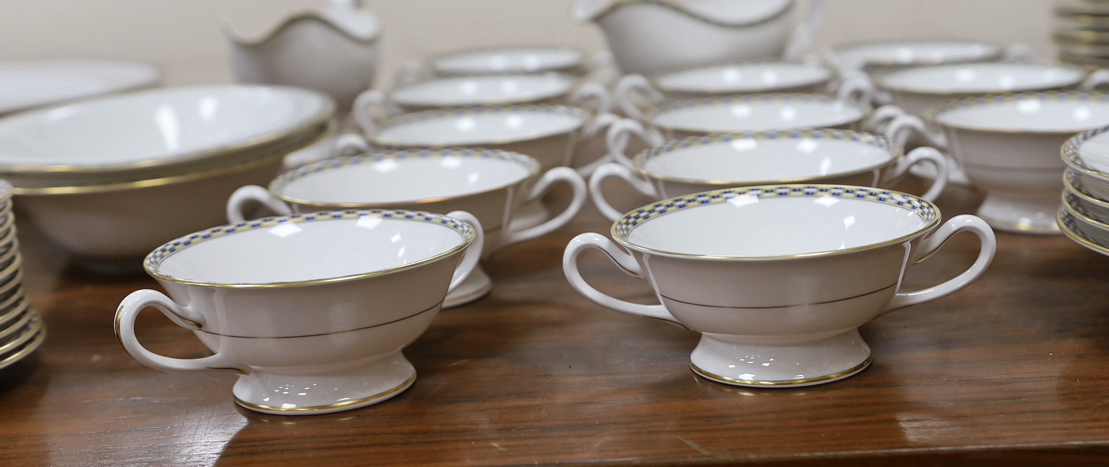 A Royal Worcester Francesca pattern dinner service, settings for 12 persons.